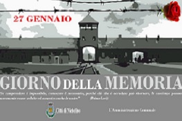 Sullo sfondo Campo di Concentramento di Auschwitz, in primo piano la scritta Giorno della Memoria